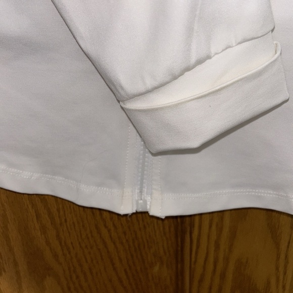 White sporty zip up, worn once. From Amazon size XL but fits like a L. - Picture 4 of 4